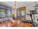 Multi-purpose exercise room or play area with wood floors and natural light at 10520 Maystar Ln, Las Vegas, NV 89135