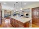 The gorgeous kitchen overlooks the living area and includes access to the backyard at 10520 Maystar Ln, Las Vegas, NV 89135