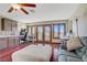 Inviting living room with hardwood floors, ample natural light, and a cozy seating area at 10520 Maystar Ln, Las Vegas, NV 89135