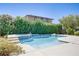 Beautiful backyard pool and spa area with lush landscaping, providing privacy and a refreshing retreat at 10520 Maystar Ln, Las Vegas, NV 89135