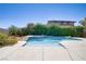 This home has a luxurious pool and backyard with lush landscaping to create a private oasis at 10520 Maystar Ln, Las Vegas, NV 89135