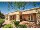 Covered back porch perfect for entertaining and dining outdoors at 10573 Bambola Pl, Las Vegas, NV 89135