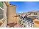 Charming balcony overlooking the community street and common area at 1201 Seaboard Ct, Henderson, NV 89002