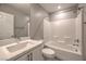 Bathroom with a shower-tub combo, a vanity with sink, and tiled floors at 1201 Seaboard Ct, Henderson, NV 89002