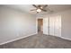 Bedroom showing carpet floors, ceiling fan and closet space at 1201 Seaboard Ct, Henderson, NV 89002