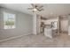 Living and dining space adjacent to a modern kitchen, featuring stainless steel appliances at 1201 Seaboard Ct, Henderson, NV 89002