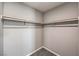 A view of a walk-in closet showing the clothing rack and carpeted floor at 1201 Seaboard Ct, Henderson, NV 89002