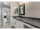 Bathroom featuring granite counters, sleek cabinetry, and ample lighting, creating a serene atmosphere at 140 Rolling Cove Ave, Henderson, NV 89011
