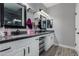 Large bathroom features dual sinks, granite countertops, modern fixtures and ample storage at 140 Rolling Cove Ave, Henderson, NV 89011
