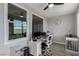 Bright office featuring large windows for ample natural light and a comfortable work space at 140 Rolling Cove Ave, Henderson, NV 89011