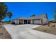 Rear exterior with extended car parking, and a large backyard at 1420 Logandale Dr, Logandale, NV 89021
