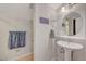 Bathroom featuring a pedestal sink and vanity at 1420 Logandale Dr, Logandale, NV 89021