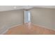 View of empty bedroom with hardwood floors at 1420 Logandale Dr, Logandale, NV 89021