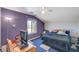 Bedroom with vaulted ceilings, carpeting, window overlooking fields at 1420 Logandale Dr, Logandale, NV 89021