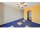 Bedroom featuring a ceiling fan and built in closet at 1420 Logandale Dr, Logandale, NV 89021