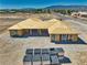 Aerial view showcasing a new home's construction with surrounding landscape and mountain views at 1550 W Jornada St, Pahrump, NV 89048