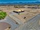 A new home in the desert with mountains in the background, blue skies and a desert landscape at 1550 W Jornada St, Pahrump, NV 89048