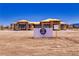 New construction home with a bright blue sky, sign in the front, and wooden framing at 1550 W Jornada St, Pahrump, NV 89048