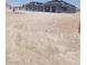 Under construction, this home features a modern design and a spacious layout at 1550 W Jornada St, Pahrump, NV 89048