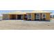 Exterior view of home under construction, featuring window framing and architectural style at 1550 W Jornada St, Pahrump, NV 89048