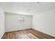 Bright bedroom features hardwood floors and a large window for natural light at 1844 Yale St, North Las Vegas, NV 89030
