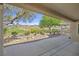 Back patio offers tranquil golf course views and privacy, ideal for outdoor relaxation at 2110 Fort Sanders St, Henderson, NV 89052