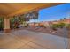 A covered patio overlooks desert landscaping at 2110 Fort Sanders St, Henderson, NV 89052