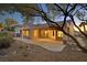 The backyard features a large patio and desert landscaping at 2110 Fort Sanders St, Henderson, NV 89052