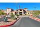 Inviting entrance to the clubhouse, showcasing the beautifully landscaped surroundings and architectural design at 2110 Fort Sanders St, Henderson, NV 89052