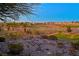 This desert home boasts views of the lush green golf course at 2110 Fort Sanders St, Henderson, NV 89052
