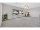 Bright living room with natural light and carpet flooring at 2110 Fort Sanders St, Henderson, NV 89052