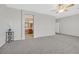 Living room with carpet flooring, light walls and ceiling fan at 2110 Fort Sanders St, Henderson, NV 89052