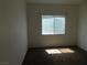 This bedroom has carpet floors and a window providing natural light at 2110 Los Feliz St # 1083, Las Vegas, NV 89156