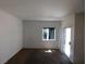 Neutral painted living room with carpet, sliding glass door, and bright natural light at 2110 Los Feliz St # 1083, Las Vegas, NV 89156