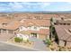 Expansive aerial view of a beautiful home with a lovely community and mountain views at 212 Harris Peak St, Las Vegas, NV 89138