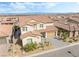 Breathtaking aerial view of a beautiful home with a lovely community and mountain views at 212 Harris Peak St, Las Vegas, NV 89138
