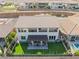 Stunning aerial view of backyard with pergola covered patio and well manicured lawn at 212 Harris Peak St, Las Vegas, NV 89138