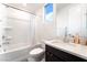 Clean bathroom with shower-tub combo, sleek vanity, and ample natural light at 212 Harris Peak St, Las Vegas, NV 89138