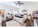 Bright bedroom features modern ceiling fan and built-in desk with vanity at 212 Harris Peak St, Las Vegas, NV 89138