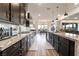 Gourmet kitchen features granite counters, stainless appliances, and sleek cabinetry at 212 Harris Peak St, Las Vegas, NV 89138