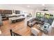 Open floor plan living room showcasing an eat-in kitchen and an outdoor living space at 212 Harris Peak St, Las Vegas, NV 89138