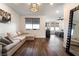 Open concept living space with wood flooring and plenty of natural light at 212 Harris Peak St, Las Vegas, NV 89138
