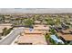 An aerial view of a community with the Las Vegas strip, Southpoint Hotel, and Rio Secco golf in the distance at 2154 Tortona St, Henderson, NV 89044