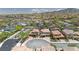 Beautiful aerial view of a residential community with well-maintained homes and scenic mountain backdrop at 2154 Tortona St, Henderson, NV 89044