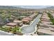 Expansive aerial shot showcasing rows of houses with tile roofs in a well-planned community at 2154 Tortona St, Henderson, NV 89044