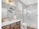 Modern bathroom featuring a glass-enclosed shower, vanity with sink, and contemporary fixtures at 2154 Tortona St, Henderson, NV 89044