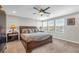 Bedroom featuring a king-sized bed, large windows, and ample natural light at 2154 Tortona St, Henderson, NV 89044