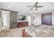 Well-appointed bedroom featuring sliding door, comfortable king bed, and TV at 2154 Tortona St, Henderson, NV 89044