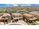 Desirable home featuring a tile roof, porte-cochere, and meticulously maintained landscaping at 2154 Tortona St, Henderson, NV 89044