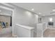 Upstairs hallway featuring neutral paint, recessed lighting and access to other rooms in the home at 2154 Tortona St, Henderson, NV 89044